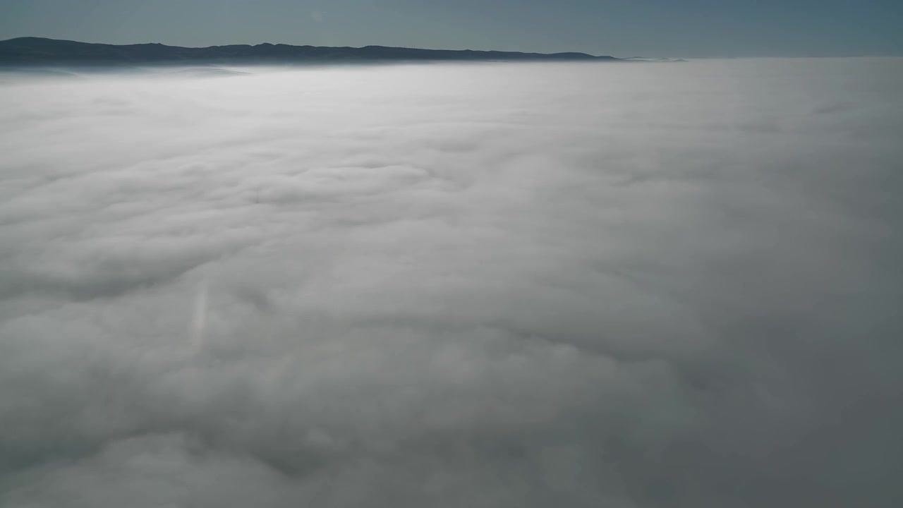 Aerial View of Thick Fog Covering the Landscape