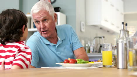 Grandfather-talking-with-his-grandson