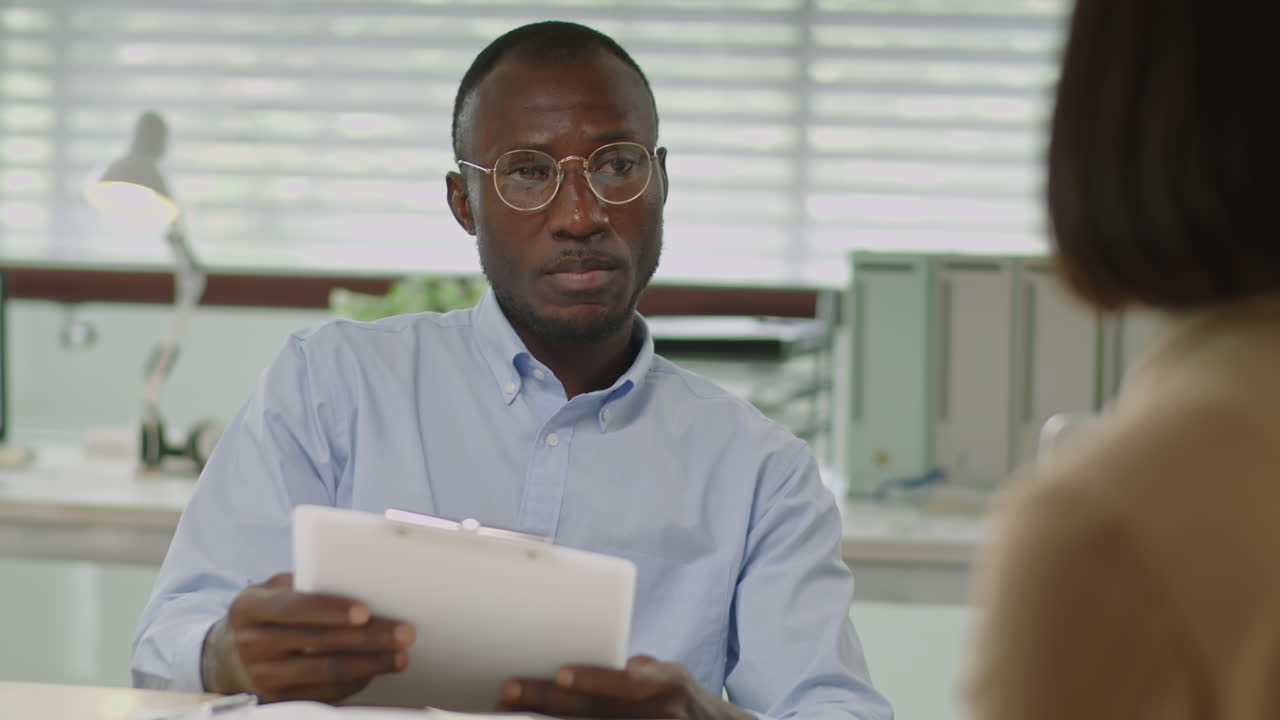 Black HR Manager Conducting Job Interview in Office