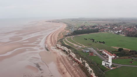 Drone-shot-over-Hunstanton-cliffs-and-light-house