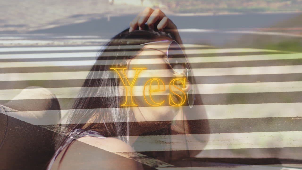 woman adjusting hair driving convertible car, showing glitch streaks glowing Yes text in marketing