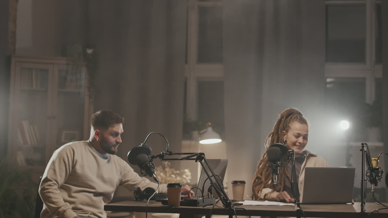 Cheerful Man and Woman Getting Ready to Record Podcast