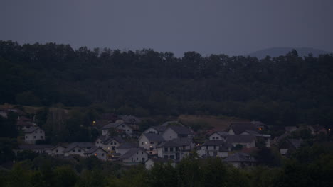 houses on a hillside at dusk