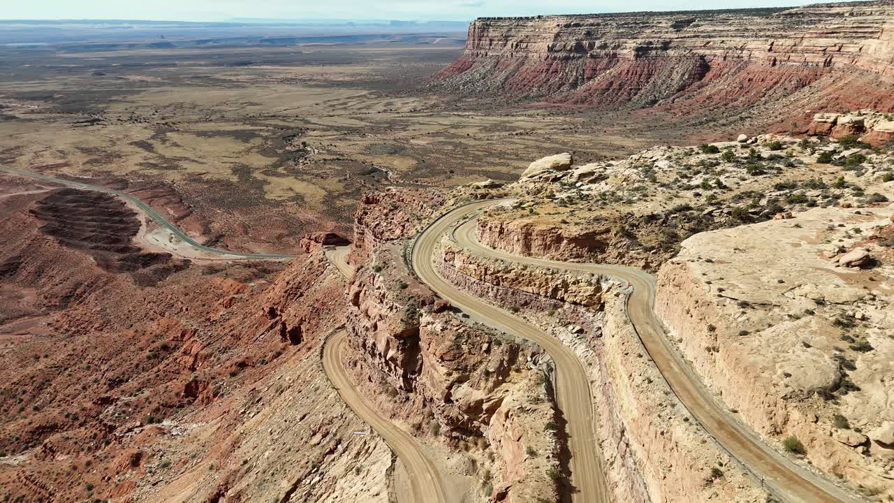 Aerial View of Switchbacks on Mountain Road, Dirt road with steep sides, Moki Dugway in Utah, hairpin turn,