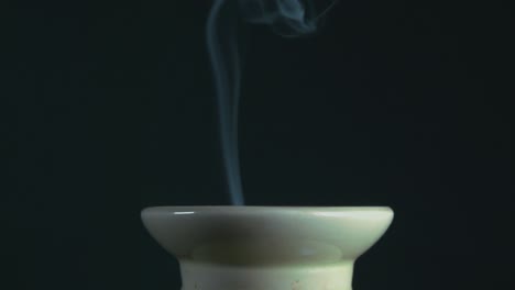 Incense-for-purification-rites,-smoke-in-slow-motion