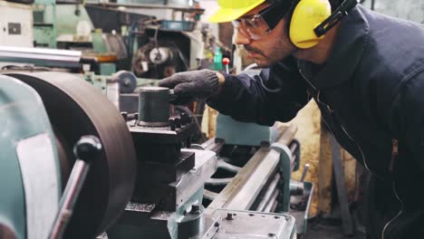 smart factory worker using machine in factory workshop