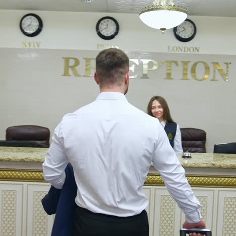 young man arriving to hotel