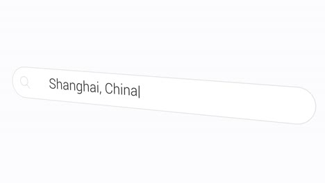 typing shanghai, china on search bar - country's biggest city and a global financial hub