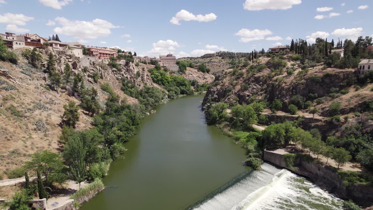 Aerial: Puente de San Martín: Historic bridge in Toledo's landscape