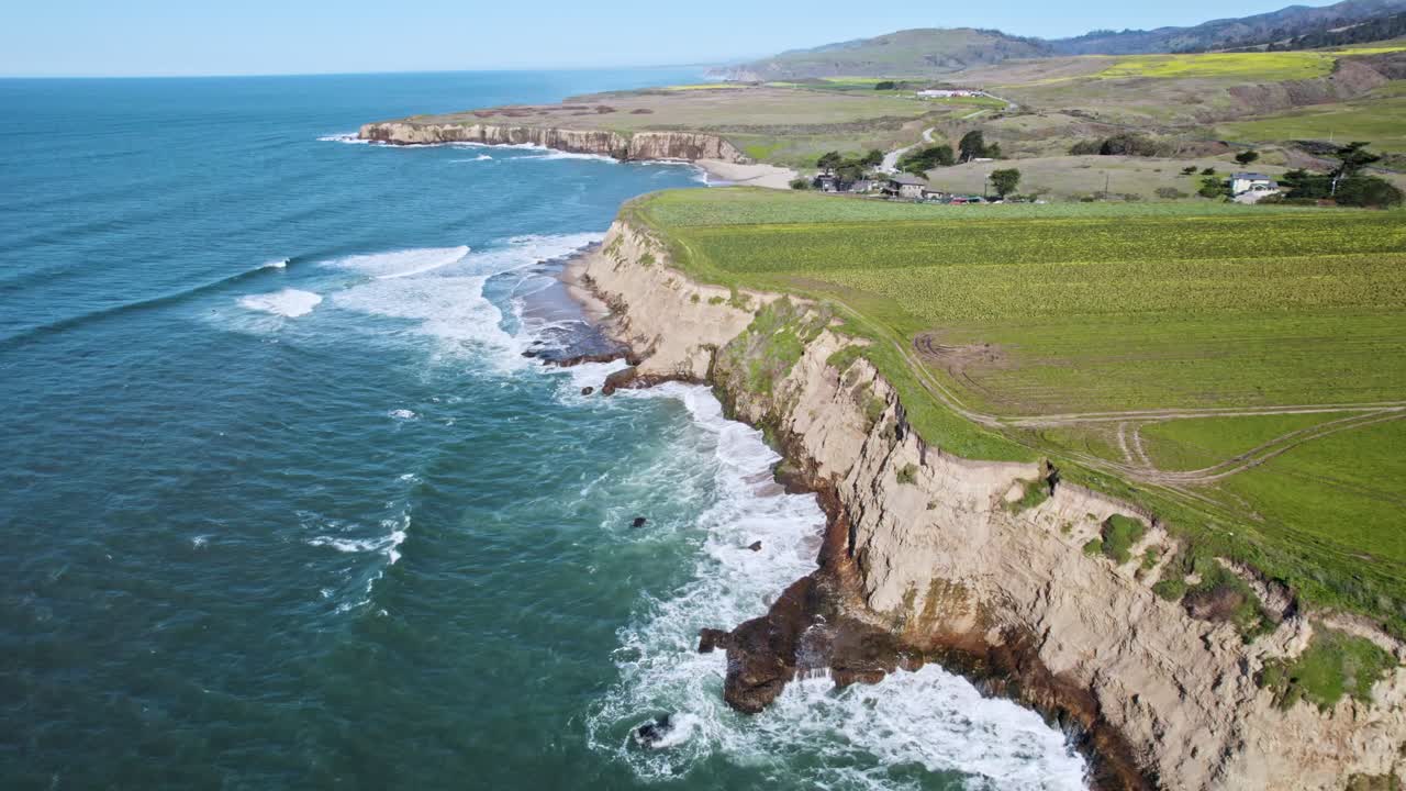 Dramatic Ocean Cliffs on the West Coast with Waves Crashing Against Rocks