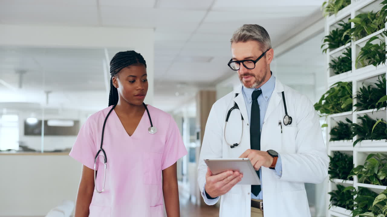 Healthcare, doctor and nurse with tablet in rehab