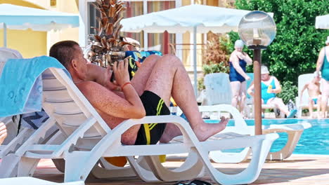 mature man relaxing on the pool