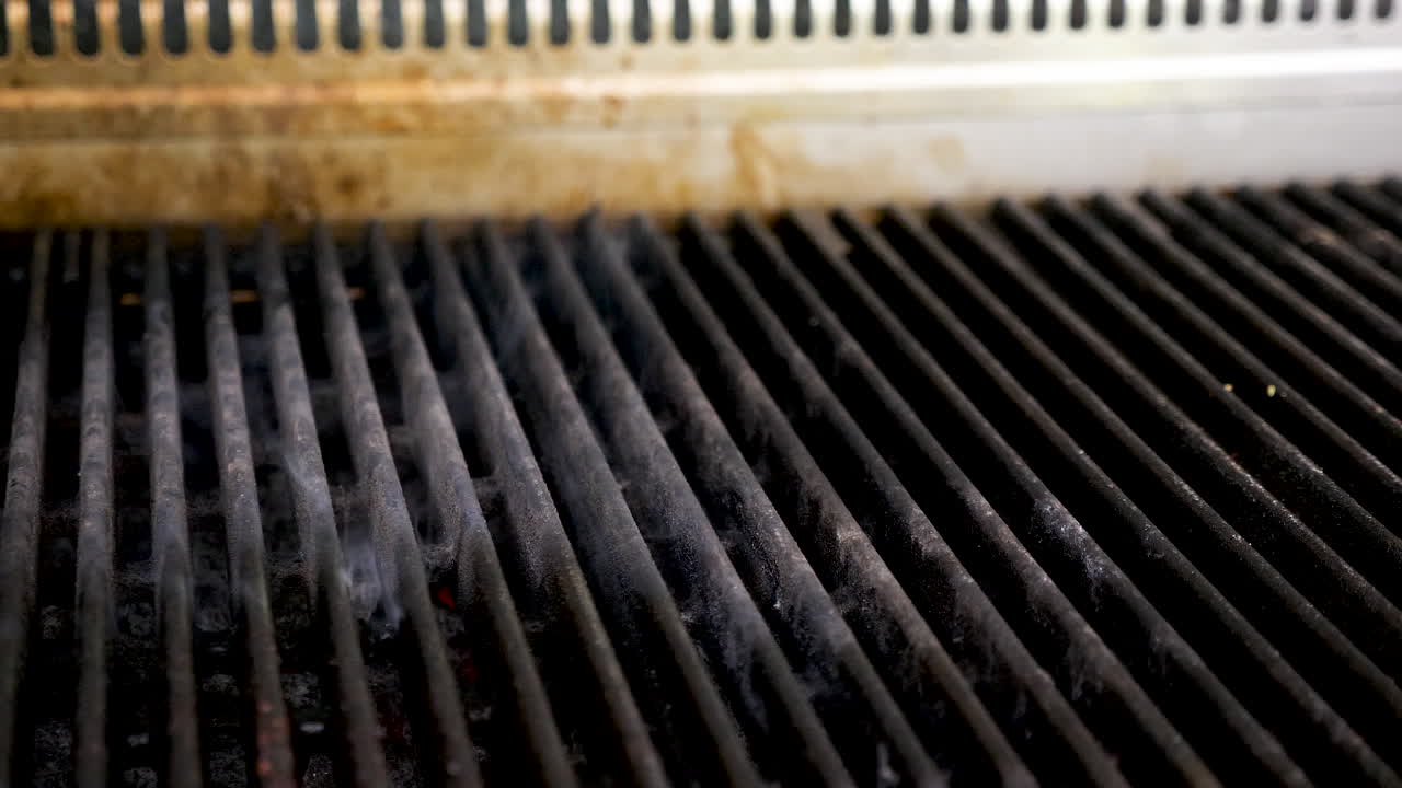 Close-up of a dirty grill grate
