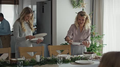 caucasian big family preparing table for christmas eve.