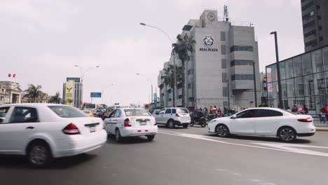 cars are jammed in traffic around centro cívico in lima, peru - pov