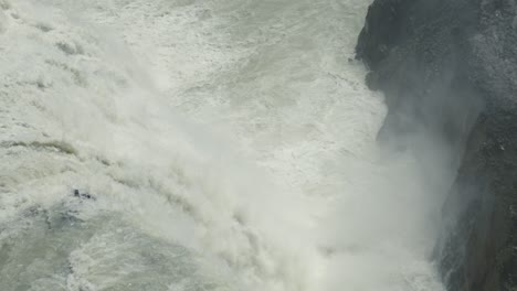 A-cinematic-slow-motion-shot-of-a-huge-waterfall,-in-the-stunning-landscape-of-Yoho-National-Park-in-the-rocky-mountains-of-Canada