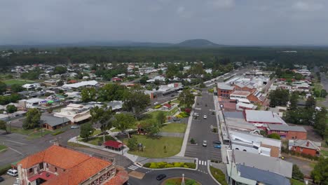 aerial: col brown rotary park during the day in kurri kurri, new south wales, australia, pull out drone shot