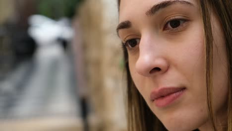 close up portrait of a beautiful young woman smiling and  looking up
