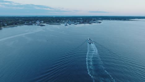 Aerial-Drone-shot-of-Orient-Greenport-North-Fork-Long-Island-New-York-before-sunrise-with-ferry-and-houses