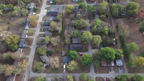 a small town in the midwest, usa, normal small town neighborhood, top down drone