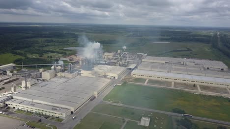 flying over a fuming factory