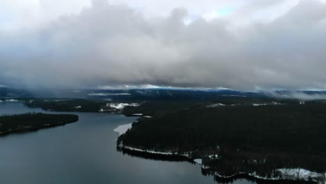 drone shot of a snowy landscape in sweden.