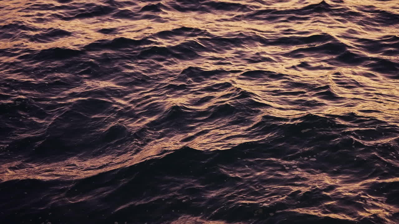 Dark Purple Ocean Waves at Sunset