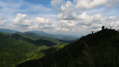 clouds moving and casting shadows on the mountains is a time-lapse taken from one of the higher mountain ridges of mae wong national park, lower north of thailand