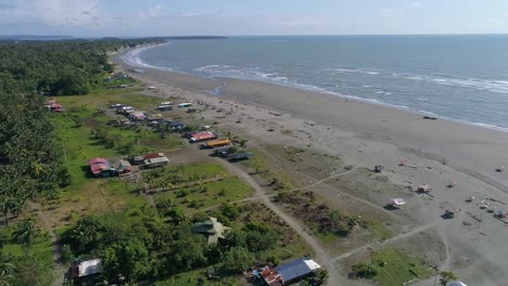 Drone-crossing-La-Barra-beach,-located-on-the-Pacific-coast-of-Colombia,-it-is-a-National-Natural-Park