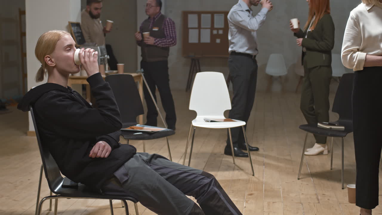 People Chatting and Drinking Coffee at Mental Support Group Meeting