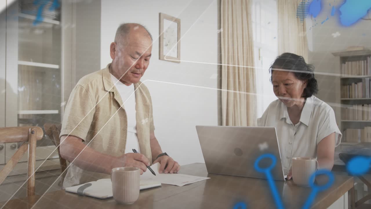 Man starting writing notes, couple reviewing laptop and papers, blue overlay tracking for finances