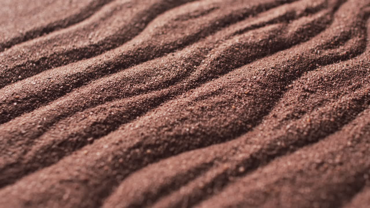 패턴과 복사 공간 배경으로 갈색 모래의 클로즈업 비디오