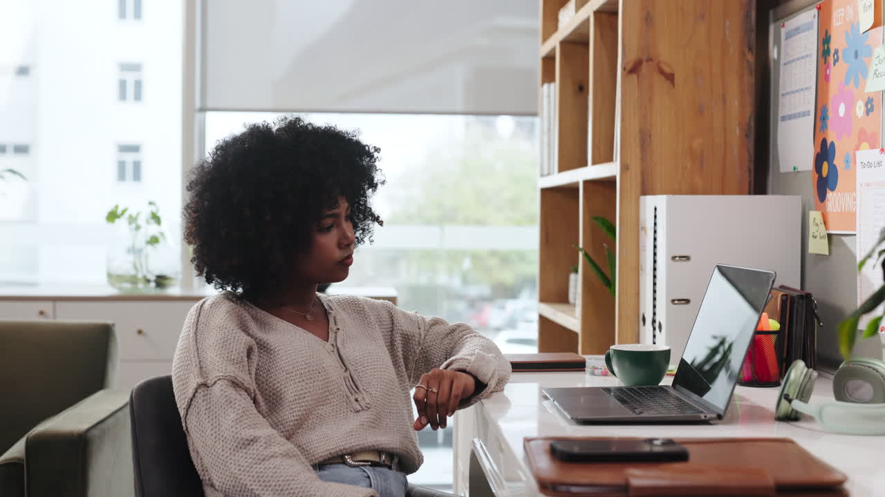Woman working at her desk in a home office