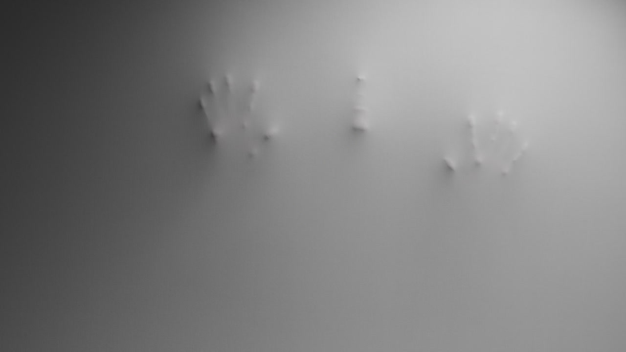 A scary silhouette of a woman appears from the white surface