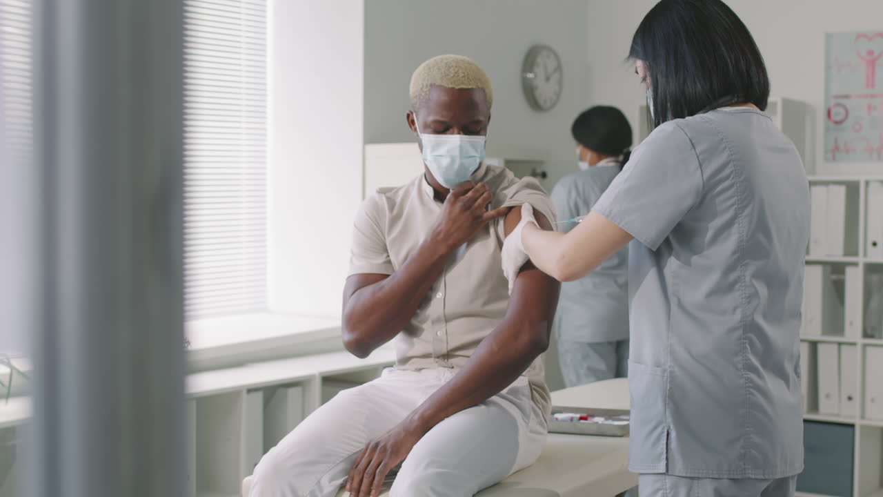 Afro Man Gets Vaccinated