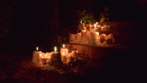 candles burning in the dark