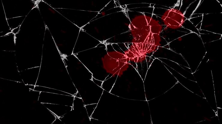 Depicting the tragic aftermath of a car accident as red blood drips down a shattered windshield. Ideal for dramatic scenes, safety warnings, or news reports on road dangers