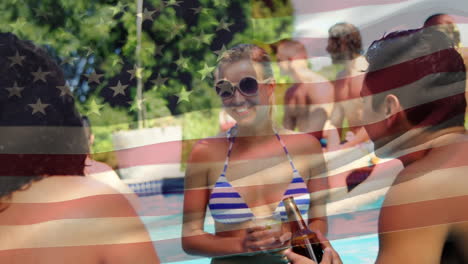 group of friends celebrating in the pool and an american flag for fourth of july.