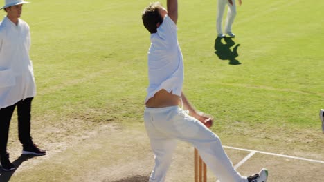 bowler delivering ball during cricket match