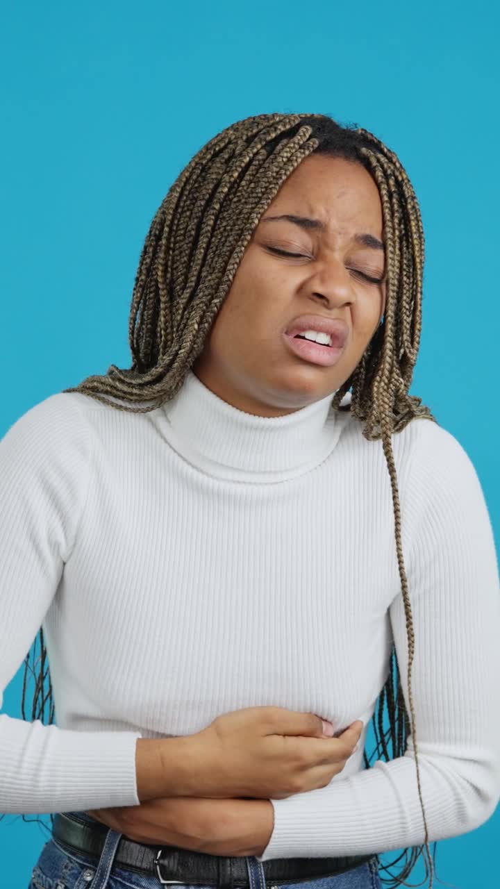 Woman experiencing pain and discomfort