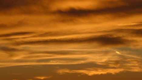 wonderful time-lapse of clouds moving across sky at sunset