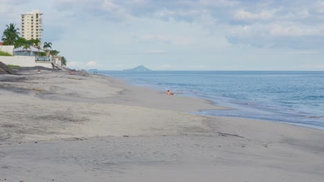 Two-Children-playing-on-the-beach