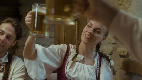 people drinking beer and celebrating oktoberfest