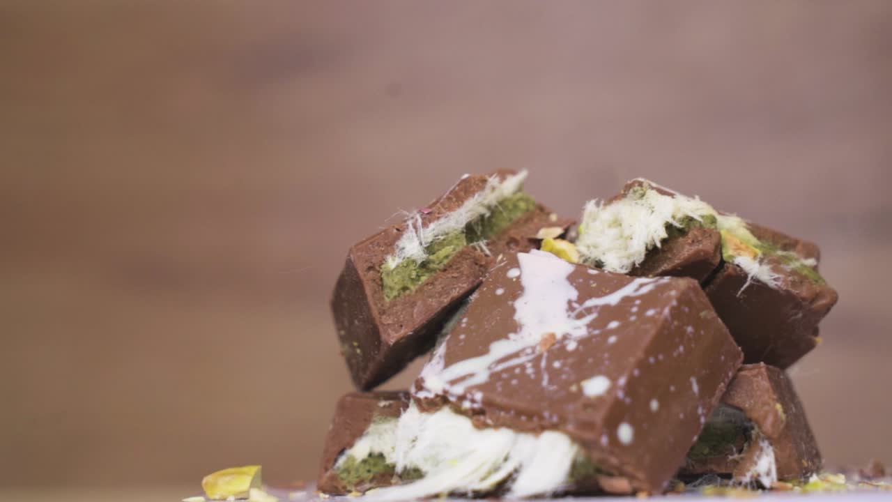 Zoomed-in view of luxury Dubai chocolate with crushed pistachios, ideal for food-focused content