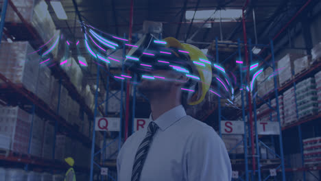 Animation-of-glowing-light-trails-of-data-transfer-and-caucasian-man-in-vr-headset