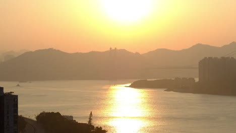 view-of-sunrise-in-the-busy-harbour-in-Hong-Kong