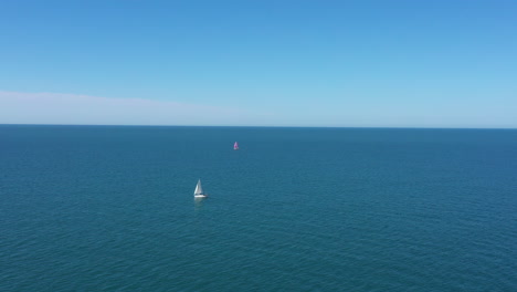 Sailing-boats-open-sea-aerial-shot-sunny-day-mediterranean-shore-France