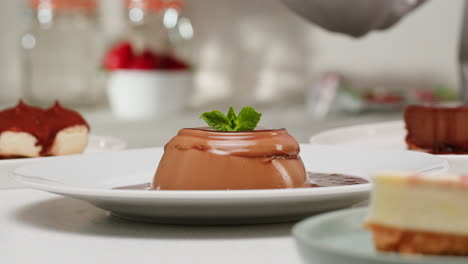 chef preparing chocolate panna cotta