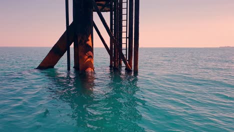 pylons base of offshore oil platform or oil rig in open adriatic sea