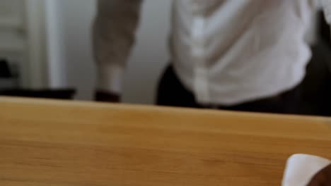 bartender cleaning bar counter in restaurant 4k